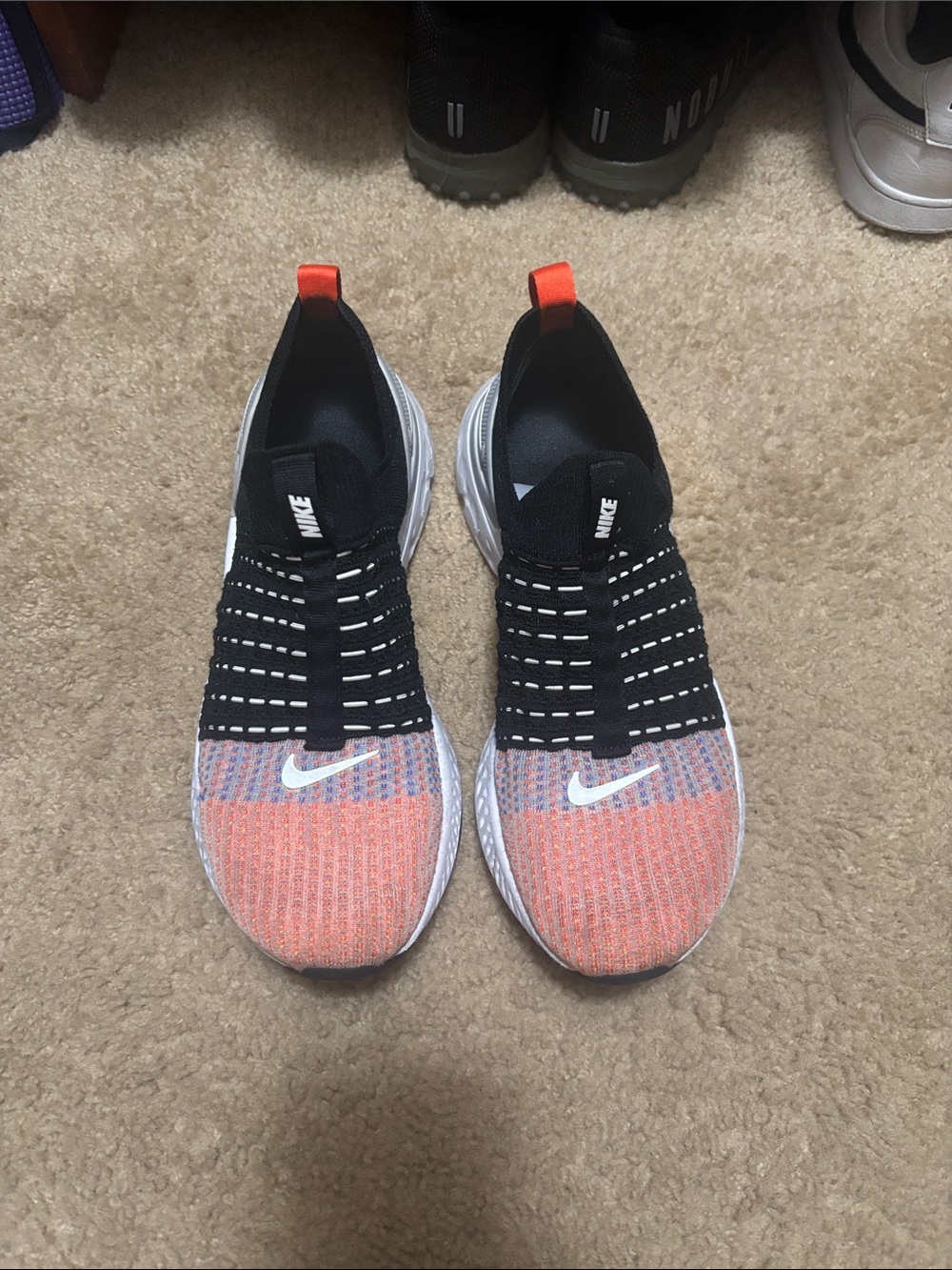 Nike Kids Slip-On Sneakers in Coral and Black